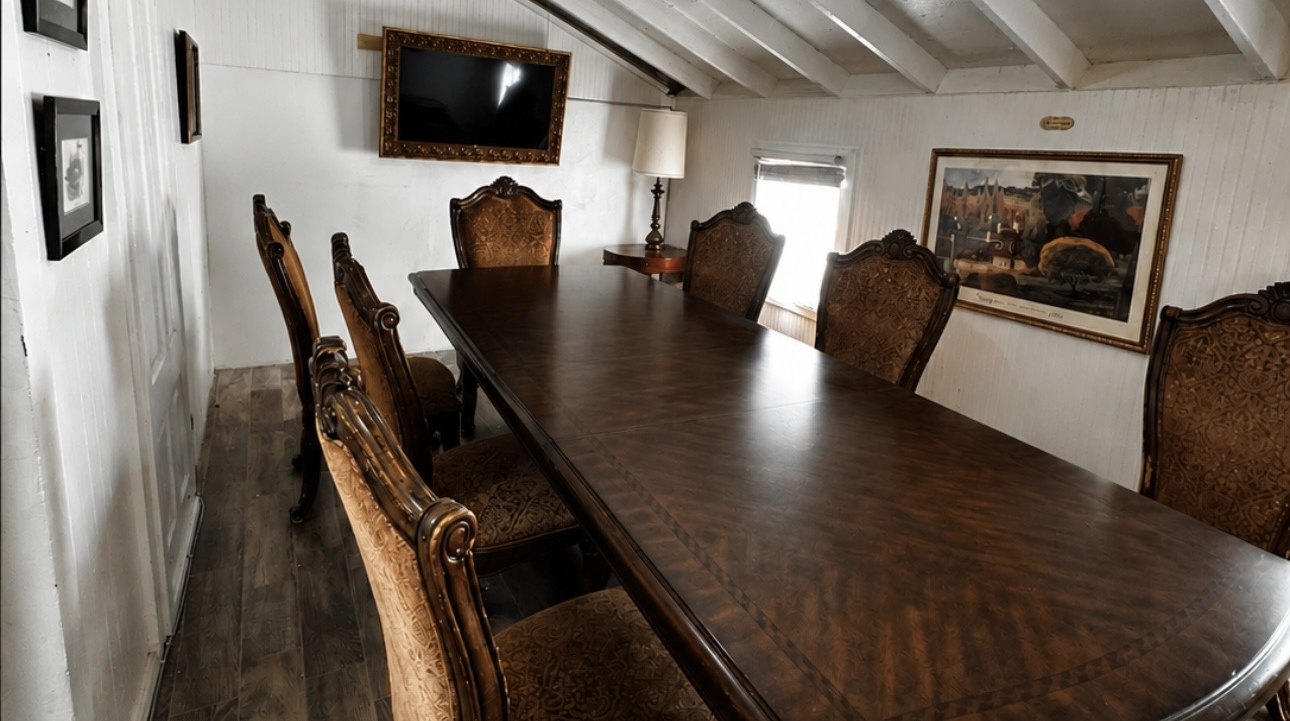 The Elsinore Boardroom at The Crescent House, a first floor meeting room with a long wood table and period furnishings